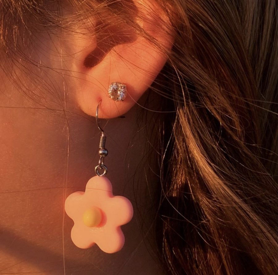 Flower charm earring available for purchase on the Silverwear Instagram account. 