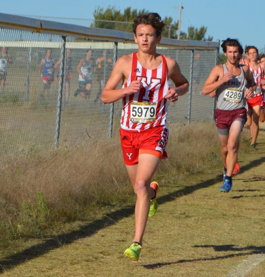 Kayden Chaparro leads a pack of runners at the COAC cross country meet. (Photo by Heather Pope)