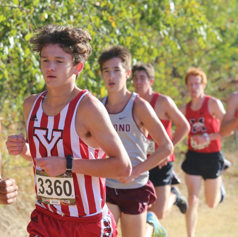 Junior Kayden Chaparro leads a group of other runners during Saturdays meet at Edmond Santa Fe. Chaparro finished 14th with a new personal record time of 17:10 in the 5k.