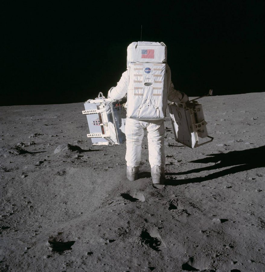 Apollo+11s+Buzz+Aldrin+carrying+research+equipment+on+the+moon%2C+starting+the+decades-long+fascination+of+what+to+do+with+the+final+frontier.+From+NASA.gov