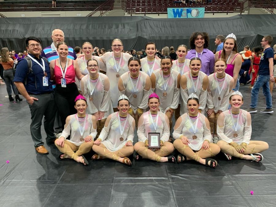 The varsity winter guard made history on multiple occasions this year at state and multiple other contests. (Paul Nguyen, Bruce Hulsopple, Hailie Eaves, Abigail Luman, Bethany Hullet, Sophia Martens, Kami Geis, Miguel Zacarias, Madison Barnes, Alahna Fields, Mika Dew, Brianna Vazquez, Kayden De Leon, Kailyn Freeman, Maia Ross, Candace Griffith, Anne Marie Beck, Makenzi Geis, Sydney Sammons)