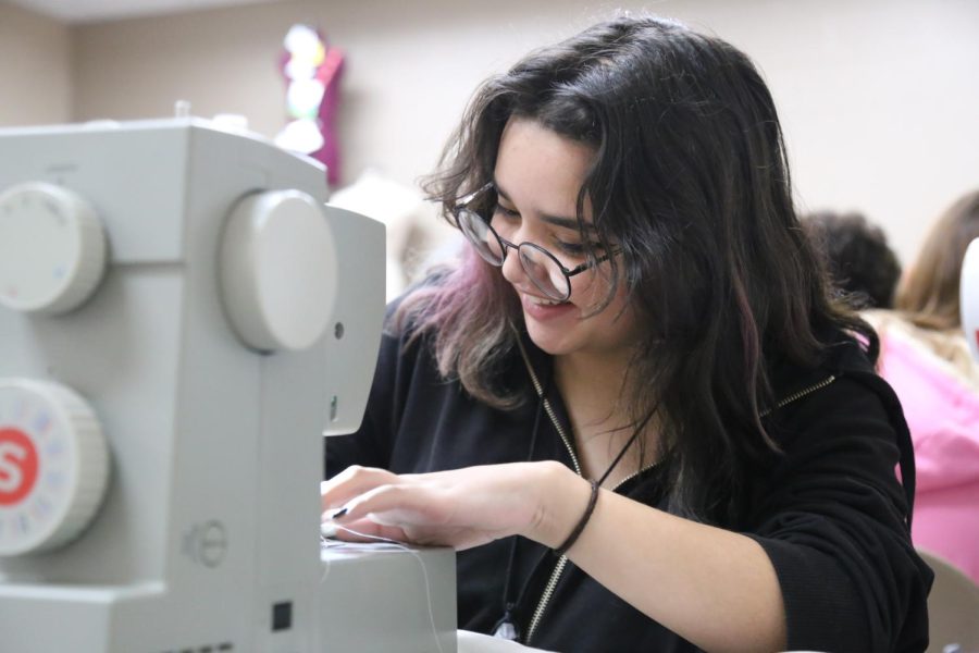 As Nicole Pena Marchant worked on making a Christmas hat during class in the sewing room. When sewing it can either be frustrating or restful and like relaxing, theres just no in between, said Shelbi Loupe.