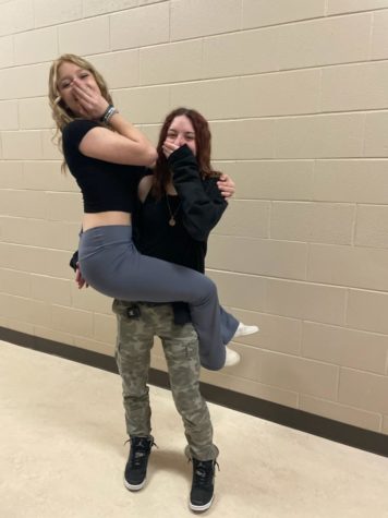 Lifting other women up
Sophomores Zoey Heron and Madison Lada pose for a picture literally embracing each other.