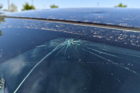 After the storms from April 19th, many cars in Yukon High Schools parking lot were left with damage, either on the windshield or dents elsewhere.