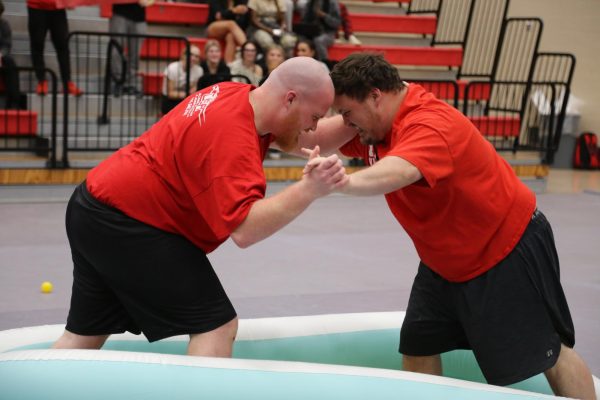 The Mason brothers, History teacher Dustin Mason and Special Education teacher Trey Mason went head to head in a wrestling match during the dares assembly. They wrestled in a ball pit and the match ended in a tie.