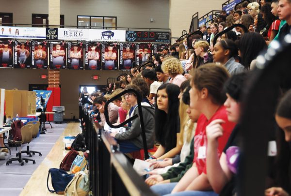 Full house. Eighth grade students piled into the high school gym, as upperclassmen volunteers prepared the second round of the activity fair while high school Head Principal Melissa Barlow gave a run-down of the events planned for the afternoon.